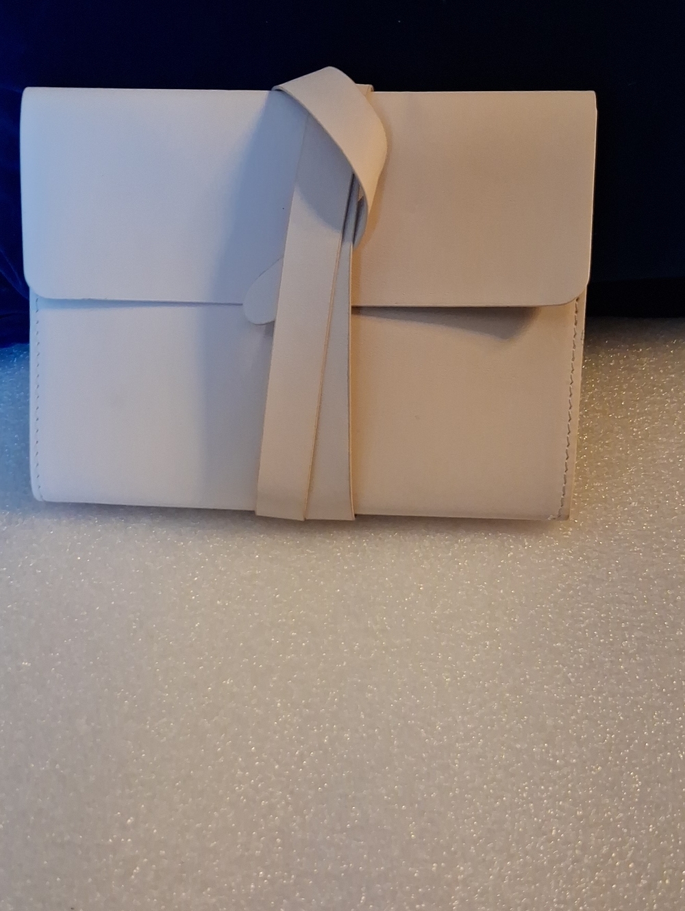 Minimalist White Wrap-Tab Clutch Bag